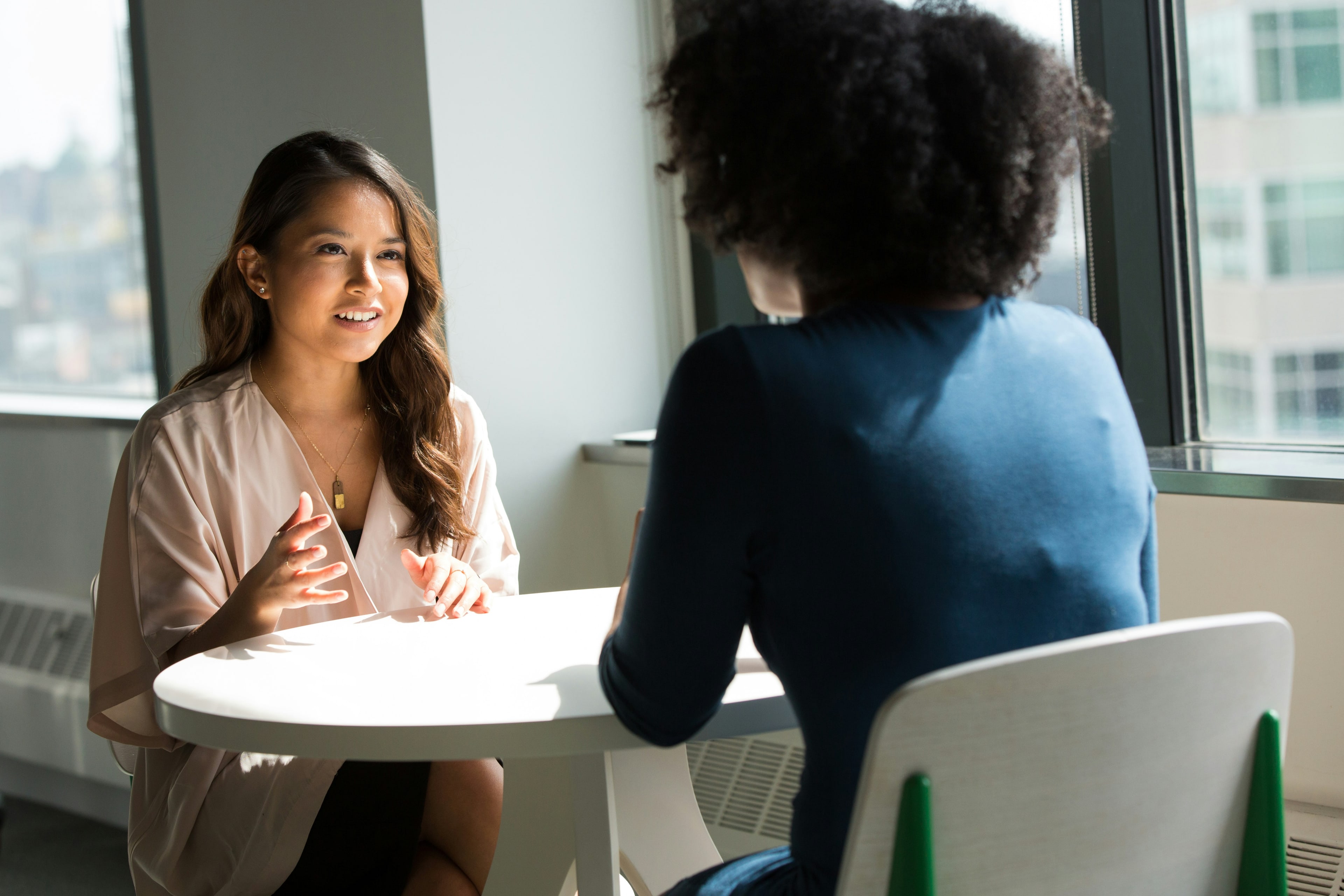 Two people in a professional consultative discussion